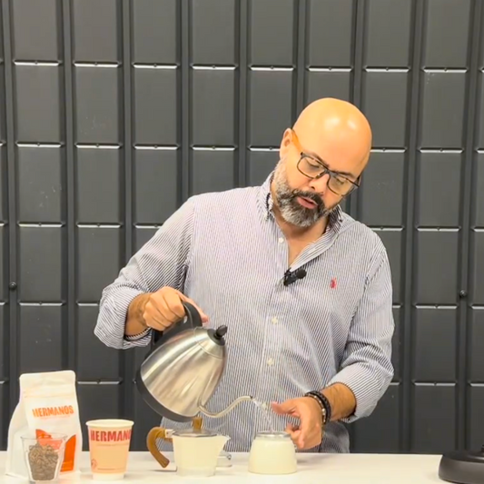 Rich and intense Colombian coffee brewing in a classic Moka pot on the stovetop.